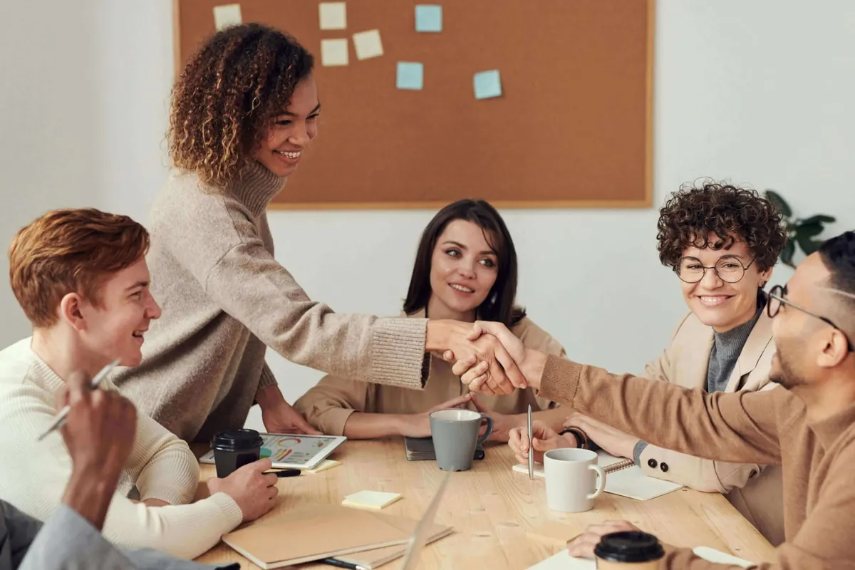 Sales professionals agreeing a new client engagement